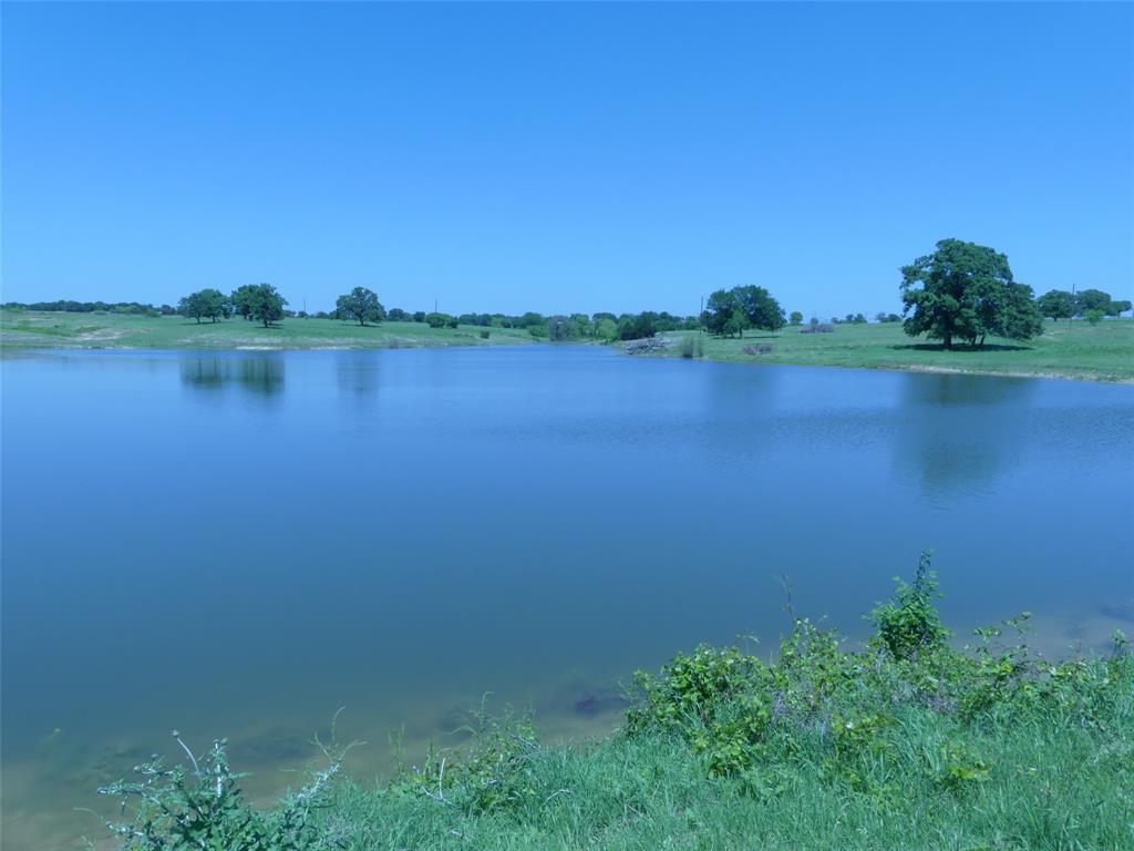3421 Schoolhouse Road Forestburg, TX 76239 - Photo 34 of 39 a view of a lake with a city