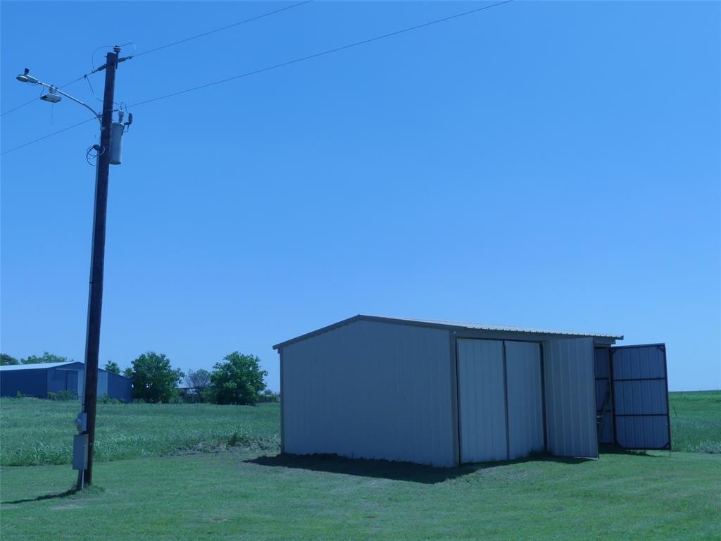 3421 Schoolhouse Road Forestburg, TX 76239 - Photo 37 of 39 a view of a backyard