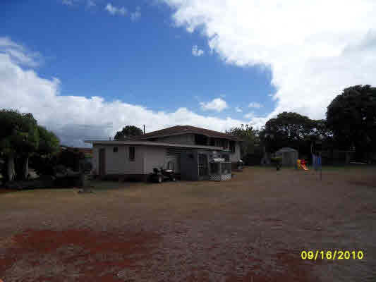 3510 Eleu Road Hanapepe, HI 96716 - Photo 2 of 10 a view of a house with a yard