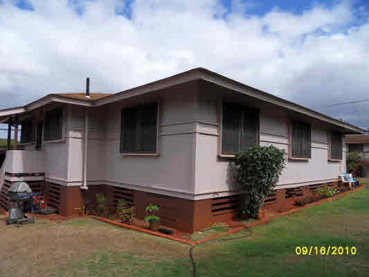 3510 Eleu Road Hanapepe, HI 96716 - Photo 4 of 10 a front view of a house with garden
