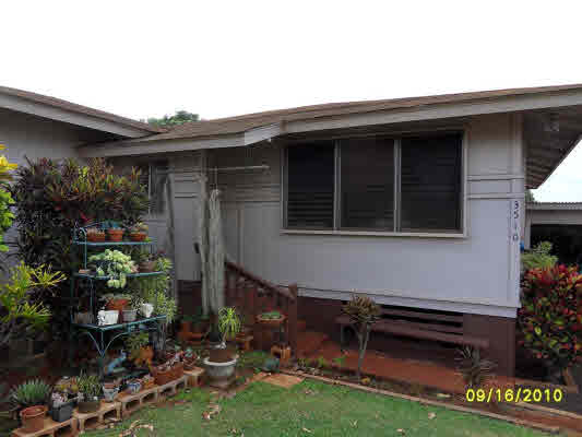 3510 Eleu Road Hanapepe, HI 96716 - Photo 6 of 10 a backyard of a house with lots of green space