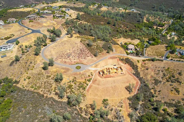 a view of a lake from a balcony