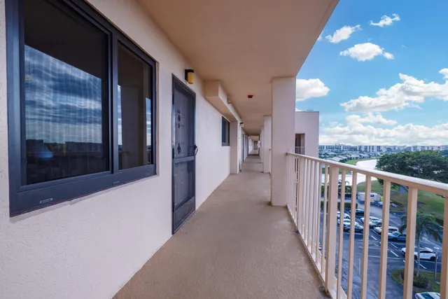 a view of hallway with mirror