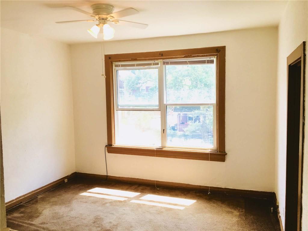 1911 Delaware Avenue Pittsburgh, PA 15218 - Photo 17 of 17 an empty room with a window