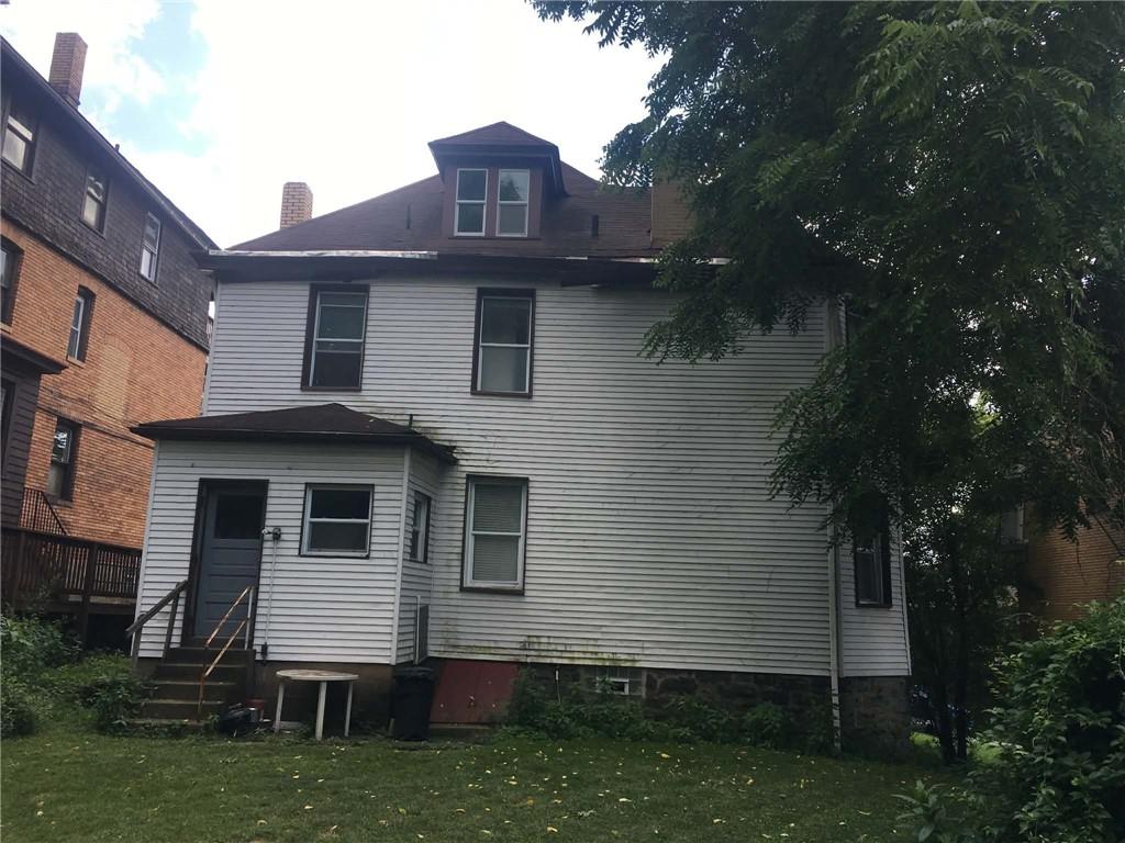 1911 Delaware Avenue Pittsburgh, PA 15218 - Photo 5 of 17 a view of a house with a yard
