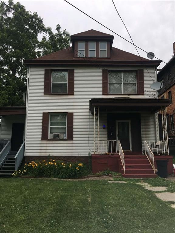 1911 Delaware Avenue Pittsburgh, PA 15218 - Photo 6 of 17 a view of a house with a yard