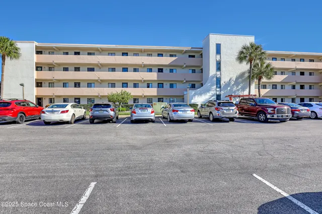 a cars parked in front of a building