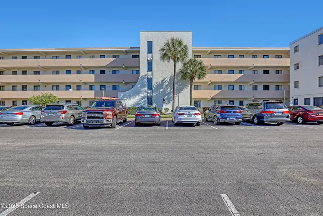 a car parked in front of a building