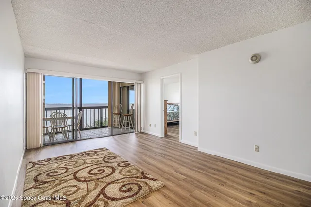 wooden floor and windows in a room