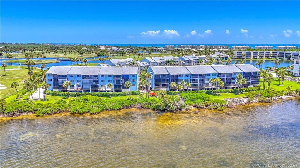10 Northeast Plantation Road, Unit 101 Jensen Beach, FL 34957 - Photo 22 of 53 a view of a city with a lake view