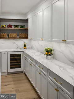 a kitchen with stainless steel appliances granite countertop a sink and a stove