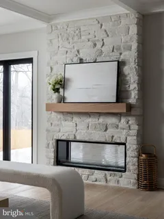 a living room with a fireplace