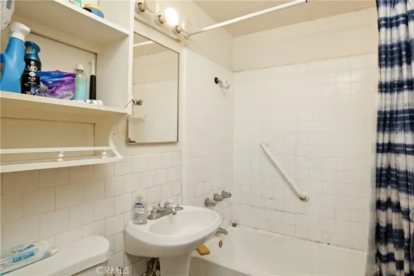 a room with furniture and a flat screen tv