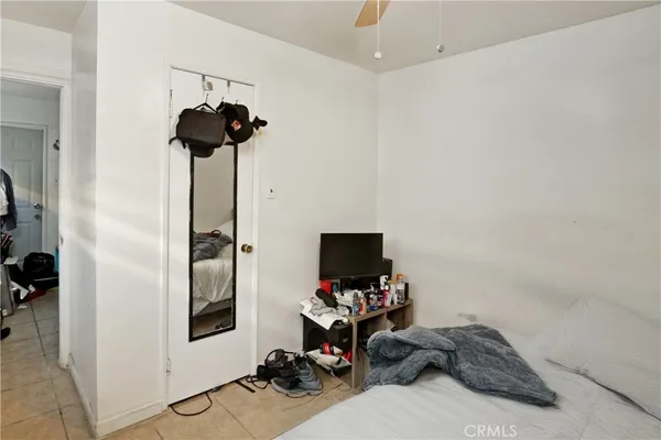 a view of a hallway with workspace and entryway