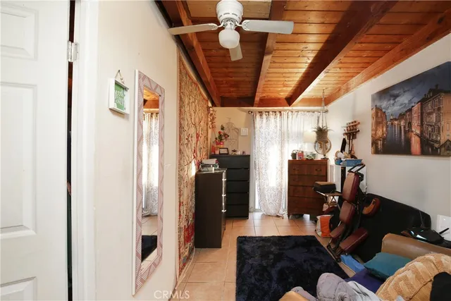 a bed room with a bed and a couch