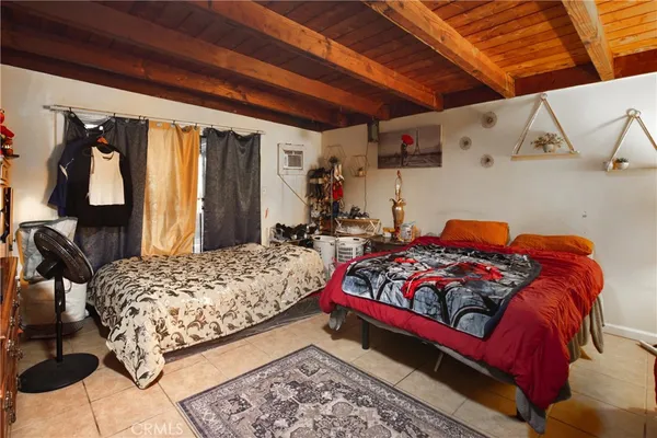 an aerial view of a house with a garden