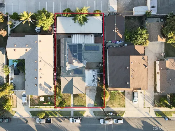 an aerial view of a city with lots of residential buildings