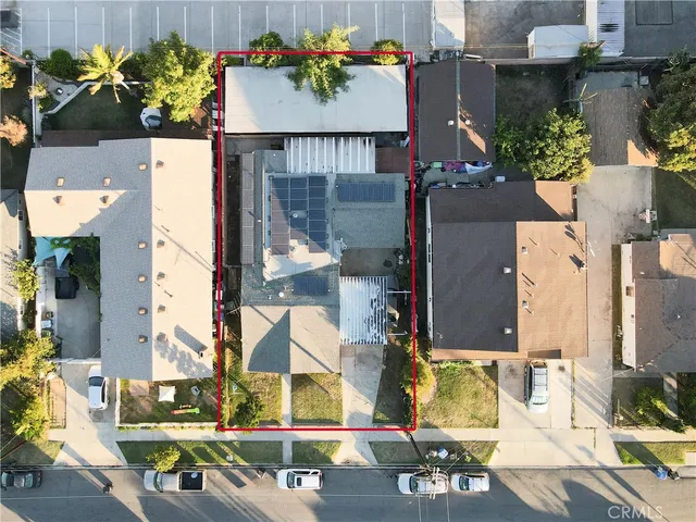 an aerial view of a city with lots of residential buildings