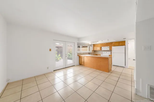 a view of kitchen with windows