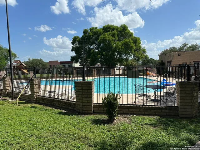 a garden view with a sitting space