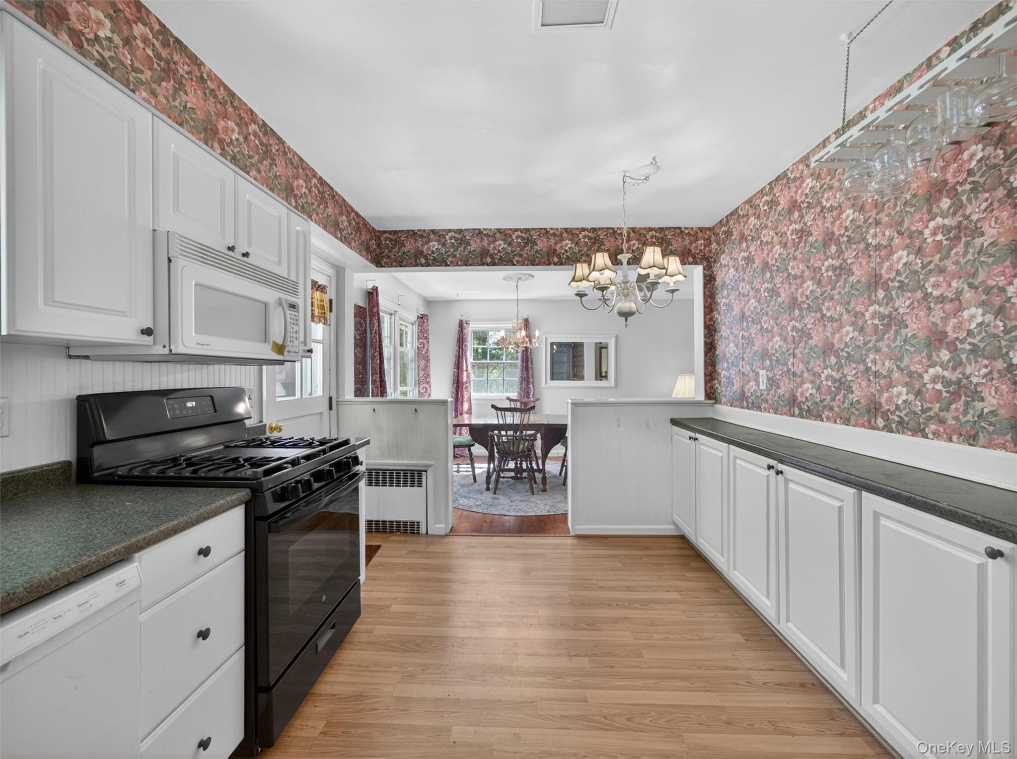 56 Oak Road New City, NY 10956 - Photo 11 of 30 a kitchen with stainless steel appliances granite countertop a stove and cabinets