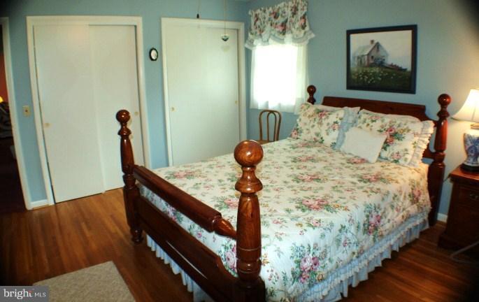 204 Thompson Road Chester, MD 21619 - Photo 24 of 30 a bed sitting in a bedroom next to a window