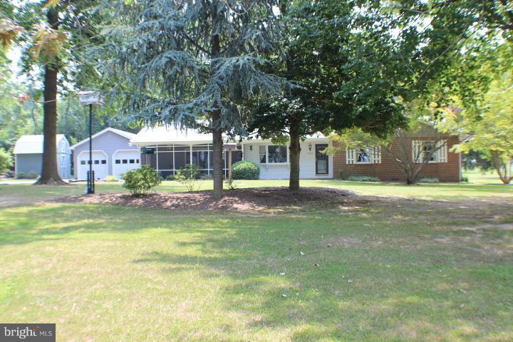 204 Thompson Road Chester, MD 21619 - Photo 30 of 30 a view of swimming pool and trees in the background