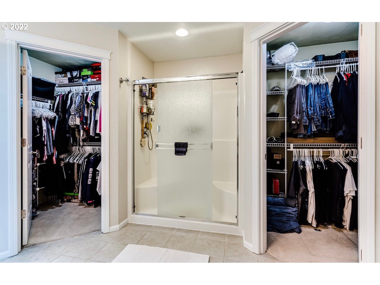 756 South 48th Street Springfield, OR 97478 - Photo 24 of 31 a view of walk in closet with clothes and shoes
