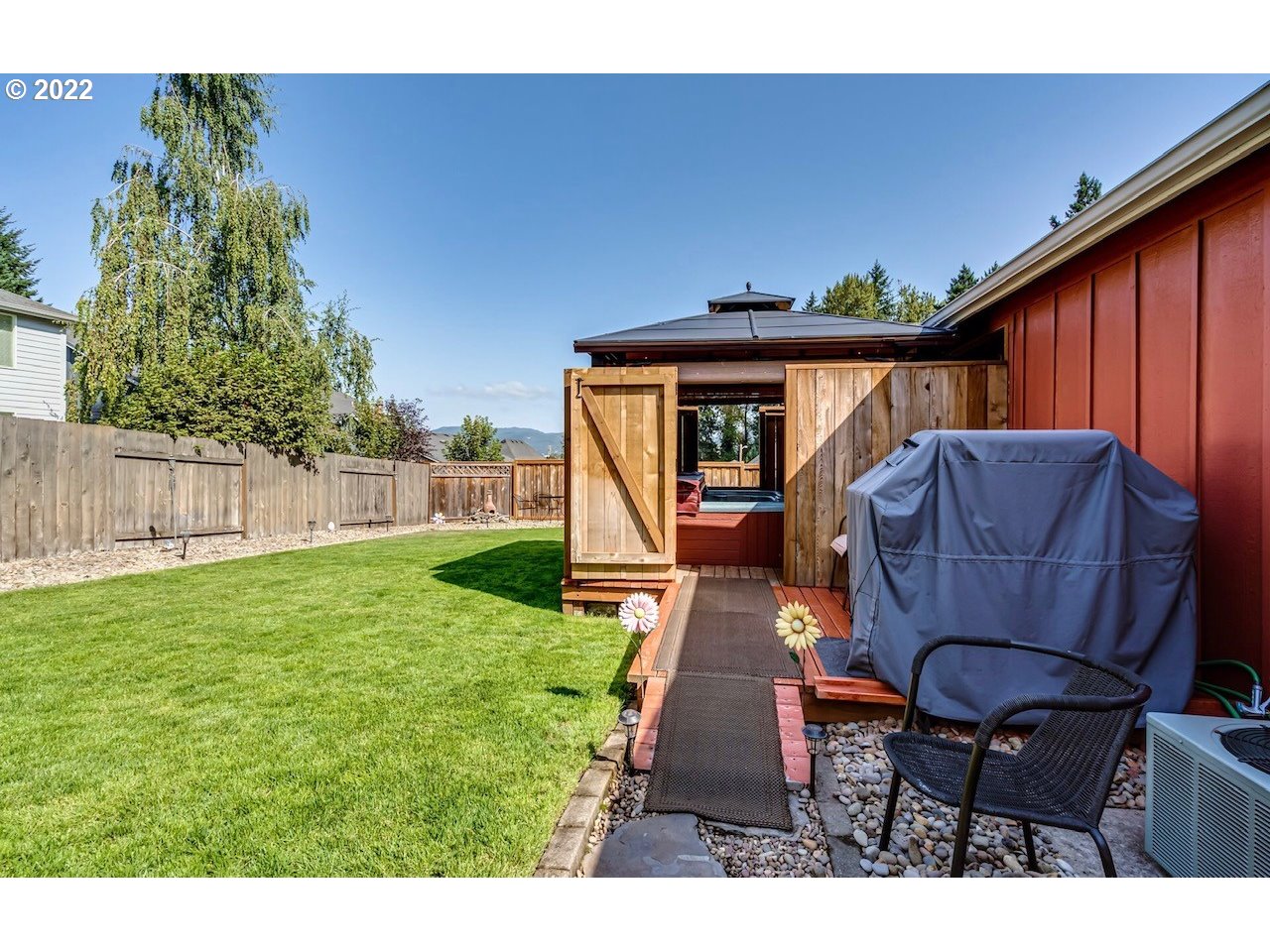 756 South 48th Street Springfield, OR 97478 - Photo 29 of 31 a view of backyard with table and chairs and wooden fence