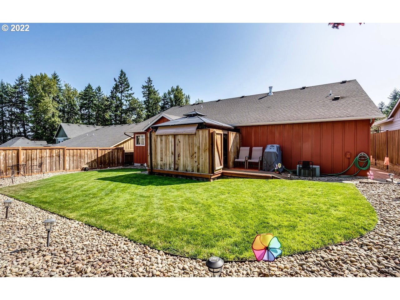 756 South 48th Street Springfield, OR 97478 - Photo 30 of 31 a backyard of a house with table and chairs