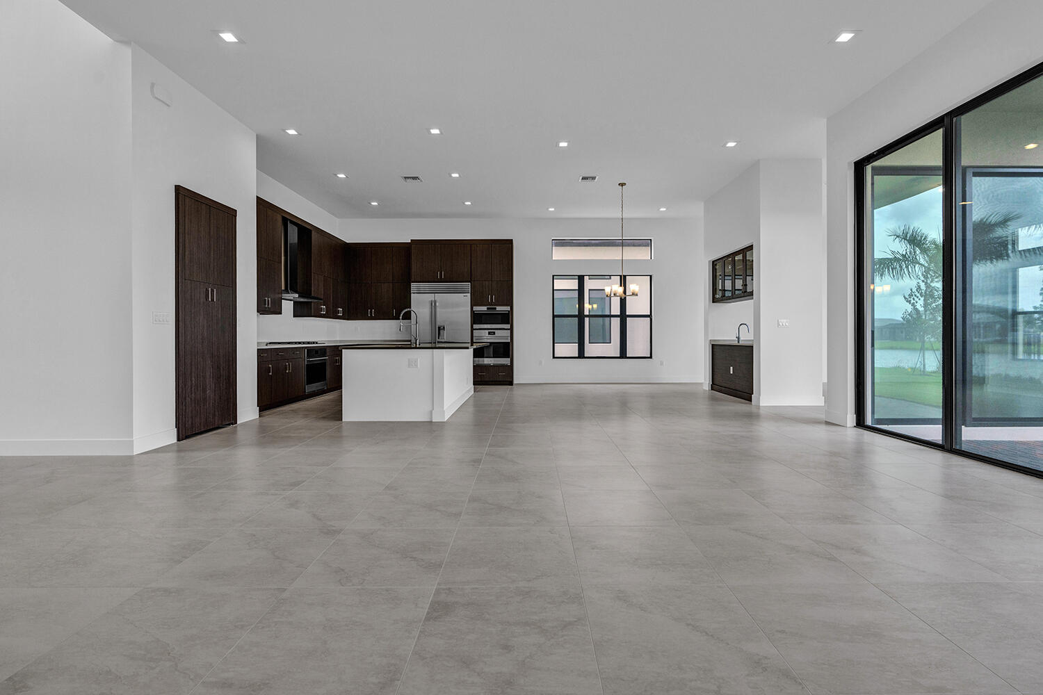 9523 Riverside Pk Drive Boca Raton, FL 33434 - Photo 7 of 47 LivingRoomKitchen1