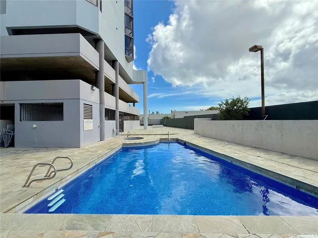 a view of a living room and kitchen