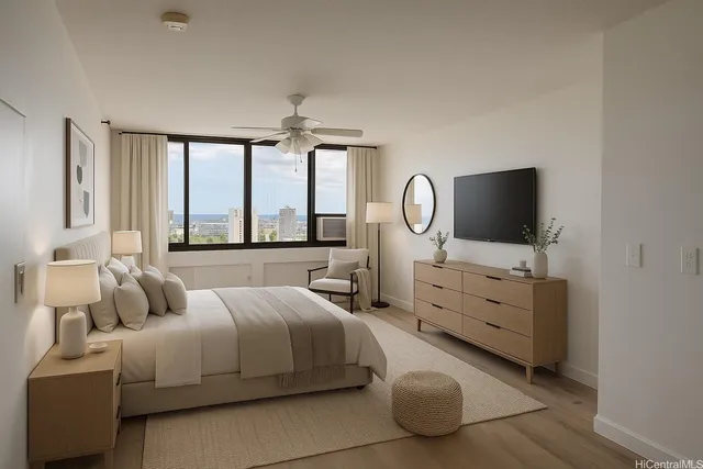 a bedroom with a bed and flat screen tv