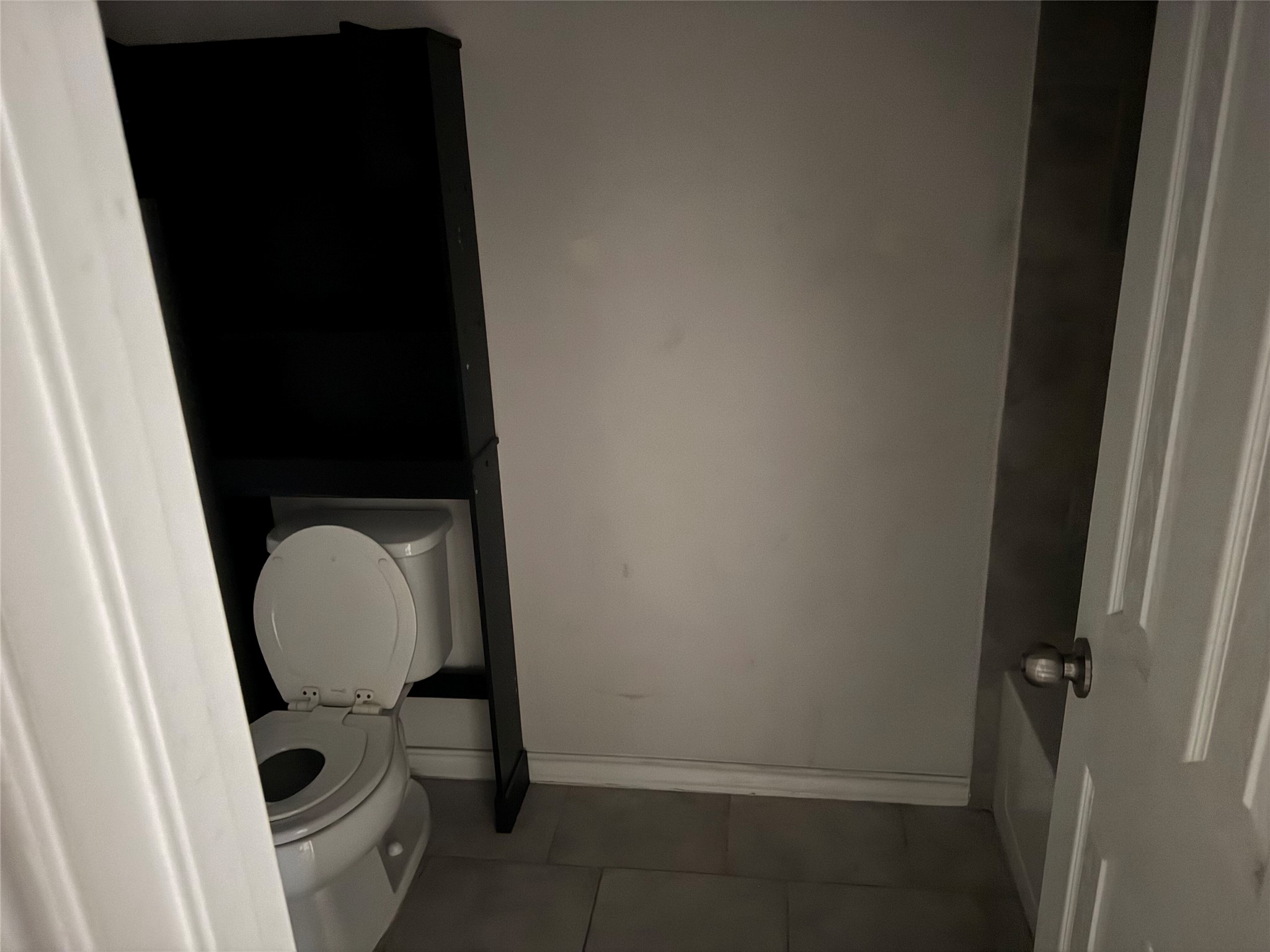 333 Capstone Road Liberty Hill, TX 78642 - Photo 32 of 40 Bathroom featuring toilet and dark tile patterned floors