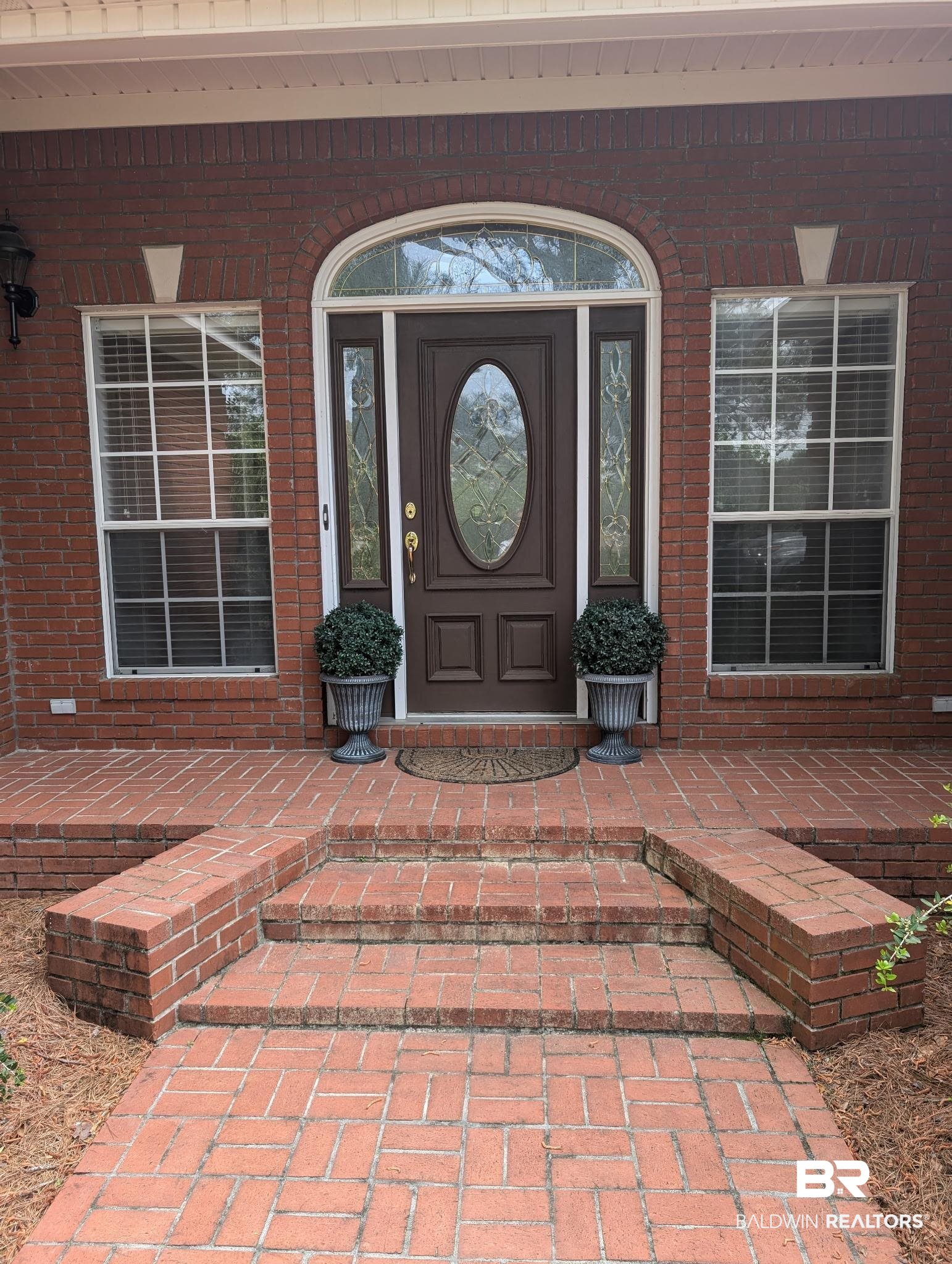 506 Old Castleberry Road Brewton, AL 36426 - Photo 2 of 14 Doorway to property with brick siding