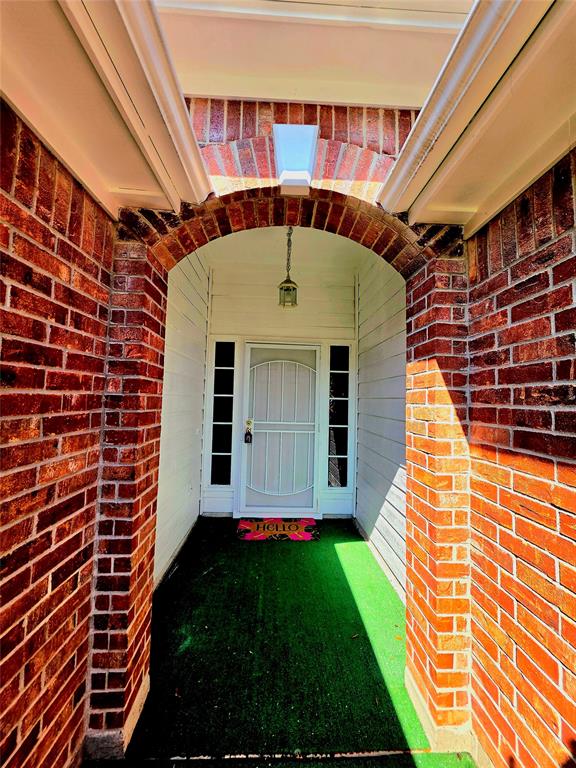 13618 Sablegrove Lane Houston, TX 77014 - Photo 5 of 30 a front view of a house with a yard