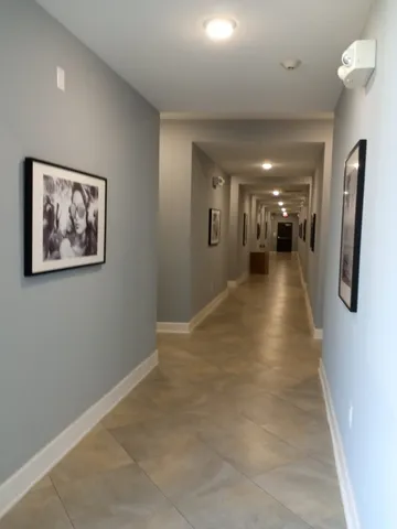 a view of gallery with windows