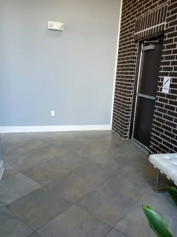 a view of terrace with seating space and barbeque oven