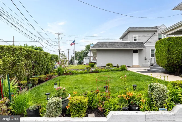 a view of a house with a garden
