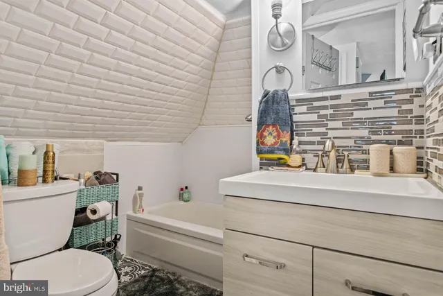 a bathroom with a sink and a toilet