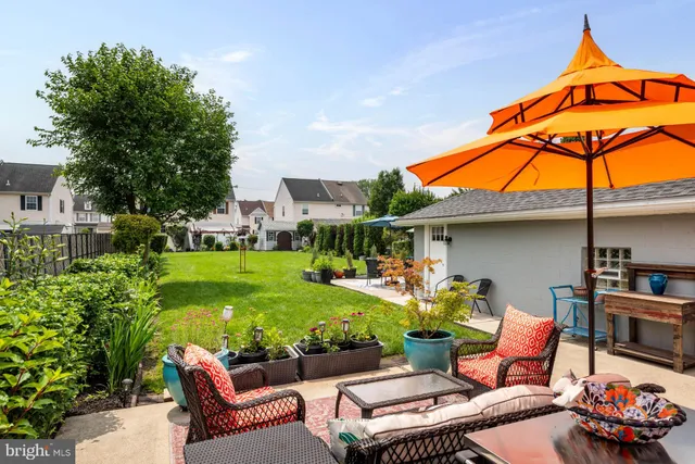 a view of an chairs and tables in the patio