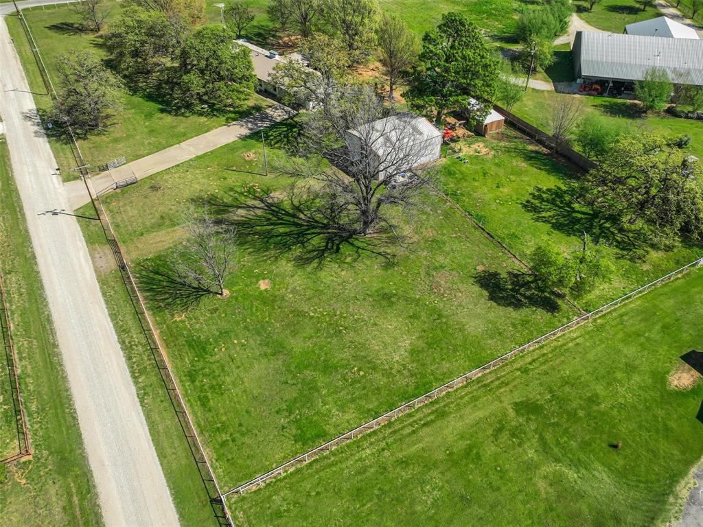 62 Sanders Road Whitesboro, TX 76273 - Photo 19 of 19 Aerial view large lot with nearly 3 acres of plush lawn and mature trees