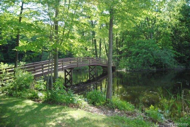 3620 Timber Ridge Drive Metamora, MI 48455 - Photo 21 of 25 Bridge over Pond 3620 Timber Rid