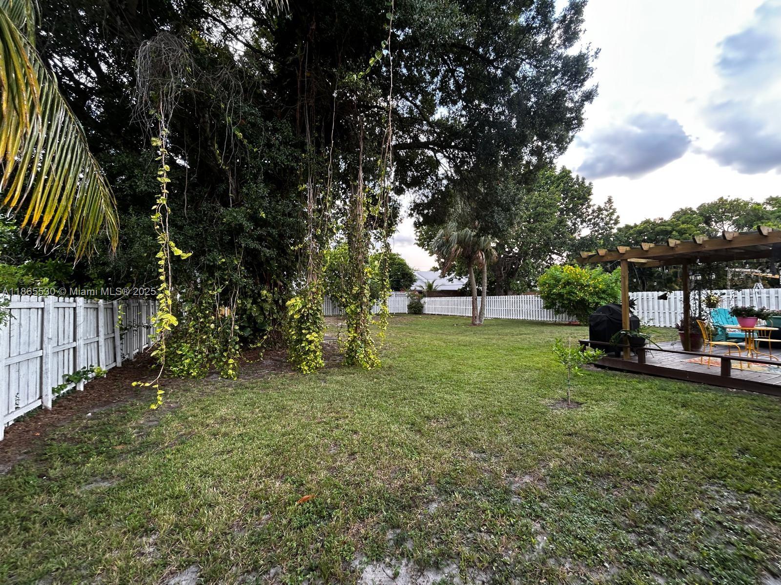 6120 Edwards Road Margate, FL 33063 - Photo 41 of 47 a view of a park with large trees