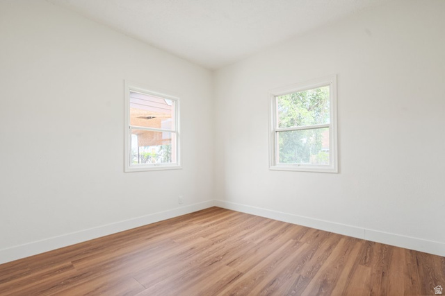 673 East 700 South Springville, UT 84663 - Photo 20 of 43 Neutral white wall paint with wood-finish flooring and white baseboards