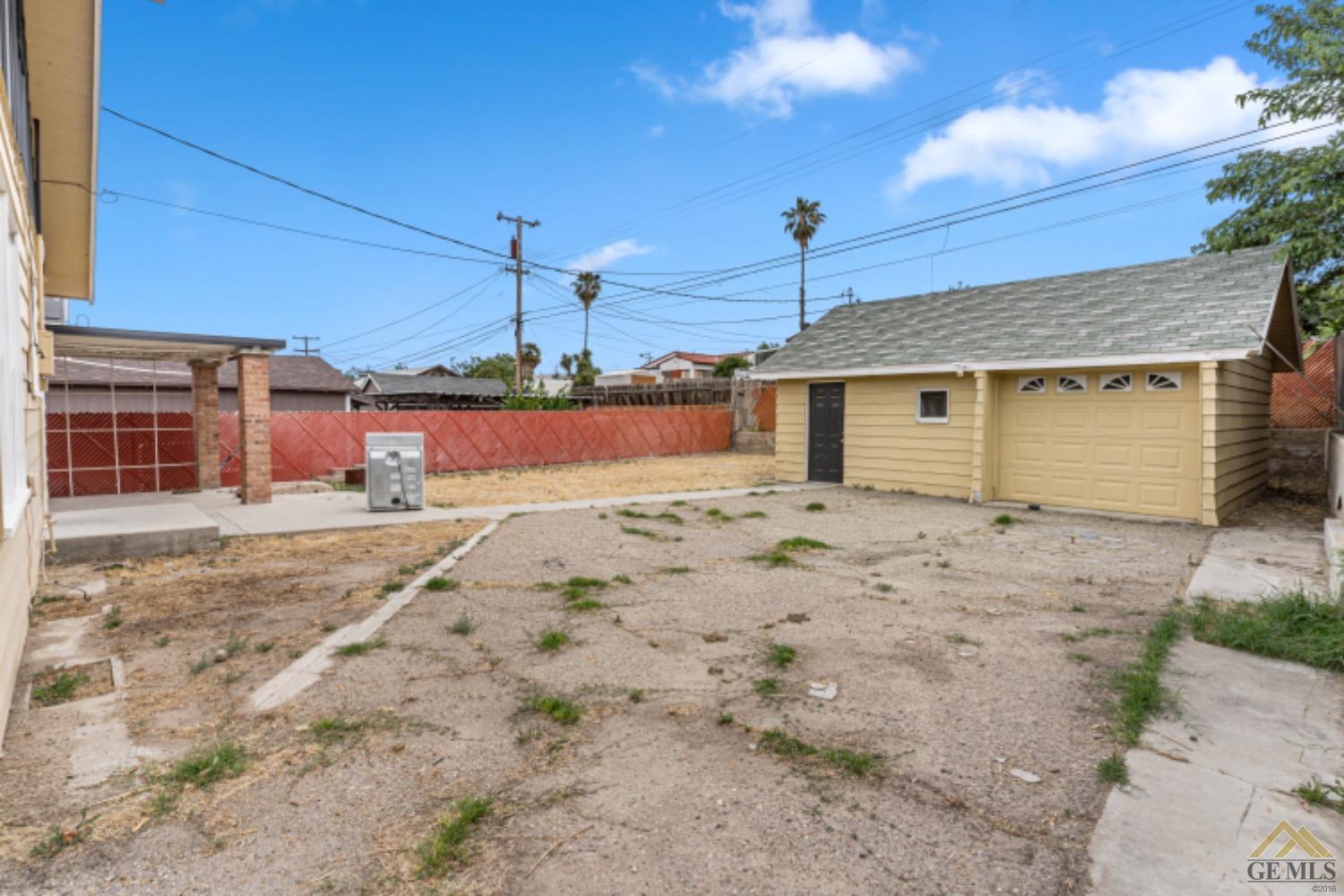 Undisclosed Address Taft, CA 93268 - Photo 16 of 17 a front view of a house with a yard