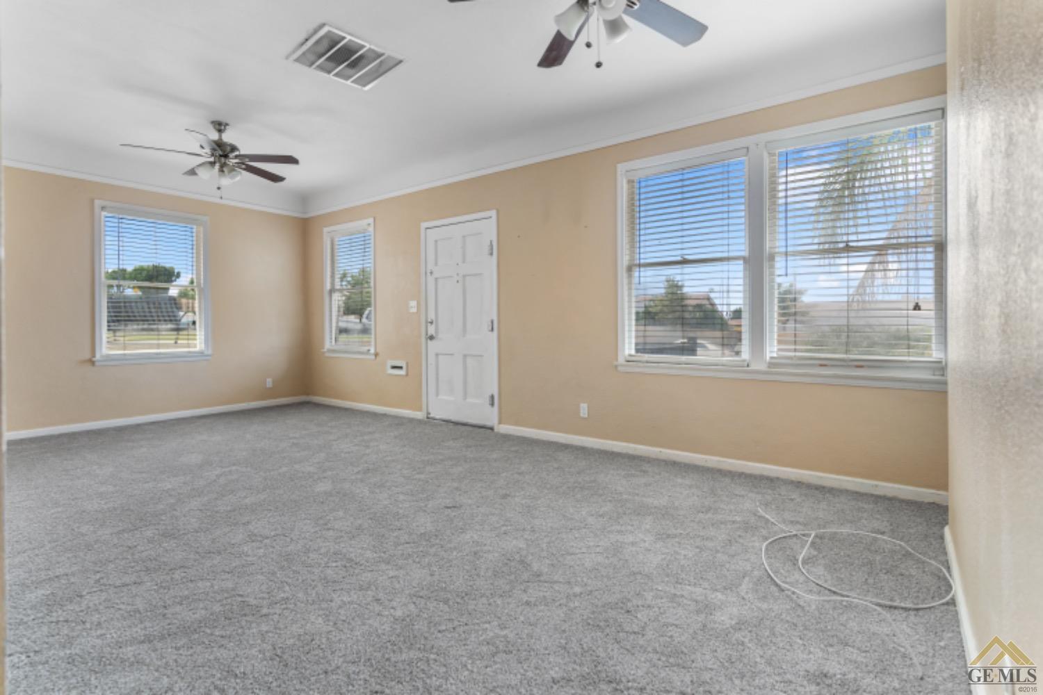 Undisclosed Address Taft, CA 93268 - Photo 10 of 17 a view of an empty room with a window