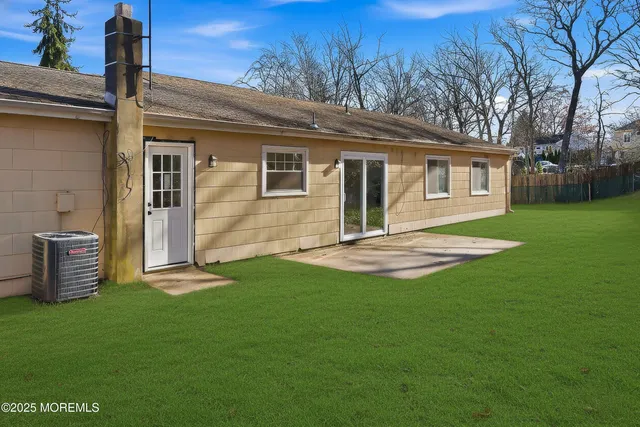 a backyard of a house with lots of green space