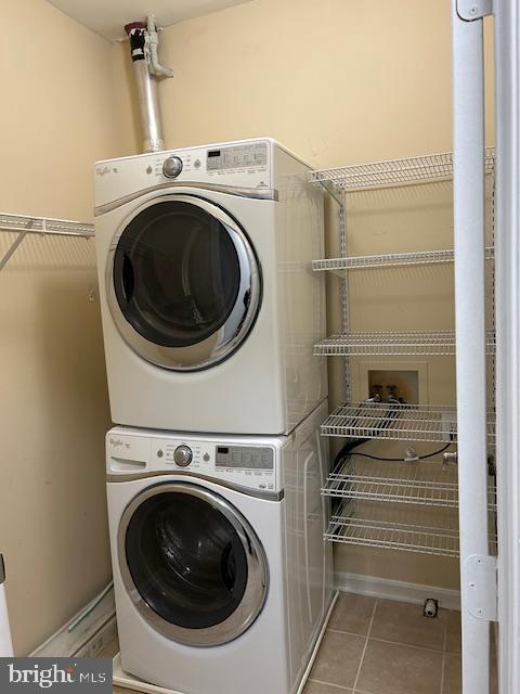 4138 Fountainside Lane, Unit 202 Fairfax, VA 22030 - Photo 33 of 36 Stackable Washer & Dryer Room w/ shelving