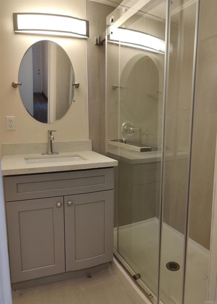 5382 Bonita Drive San Diego, CA 92114 - Photo 3 of 15 a bathroom with a sink and a mirror